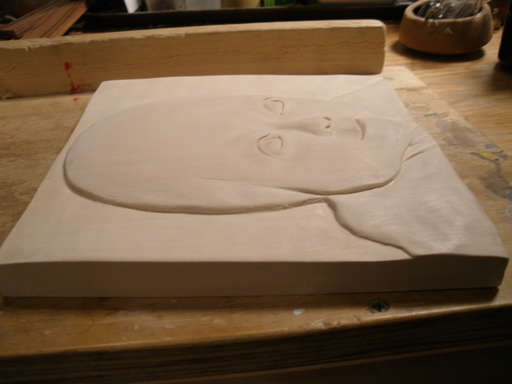 baby wood carving relief